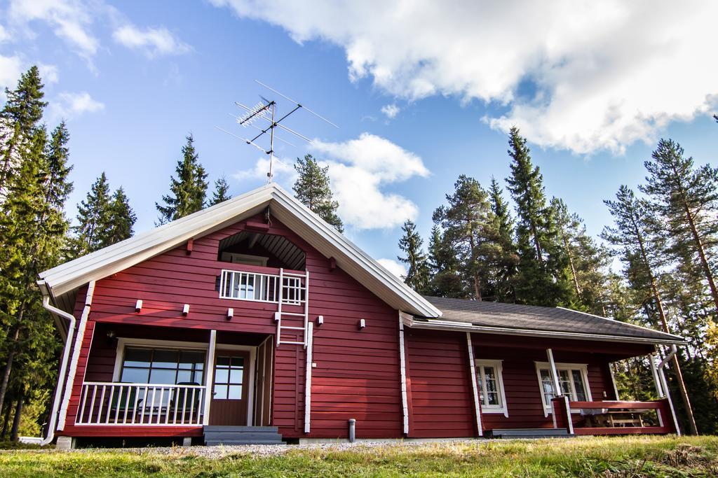 Lomaperkkioe Cottages كايانِ الغرفة الصورة